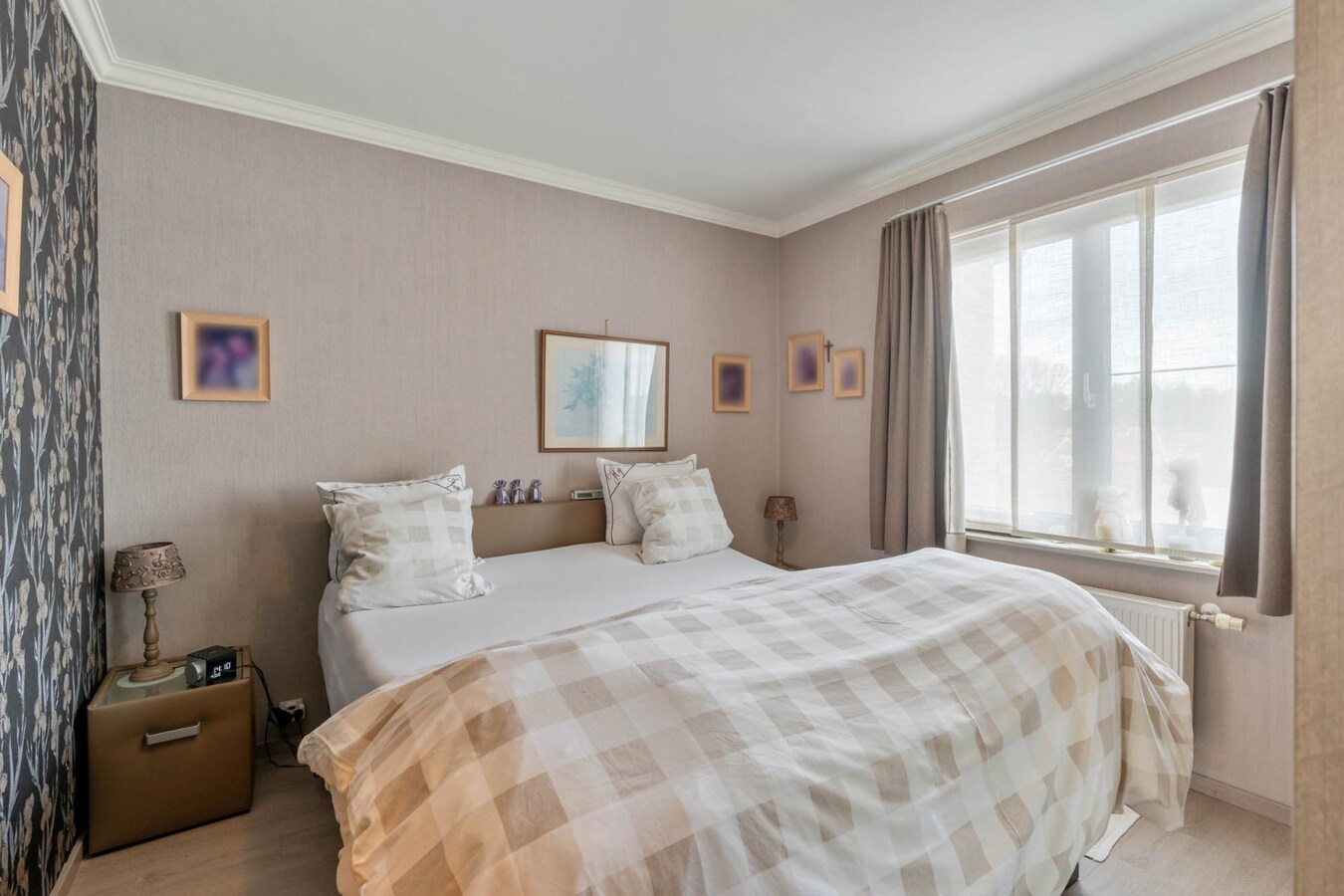 Comfortabel investeringsappartement met 2 slaapkamers en garage, in dorpskern 