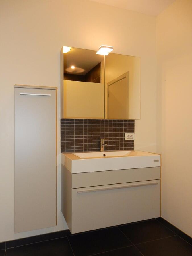 Gelijkvloers appartement met tuin 