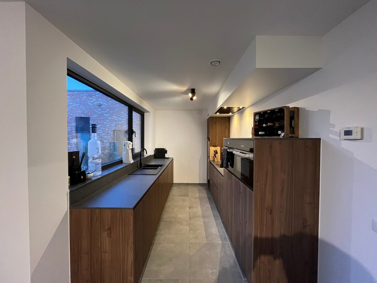 Nieuwbouwwoning in woonerf, hartje Gavere 