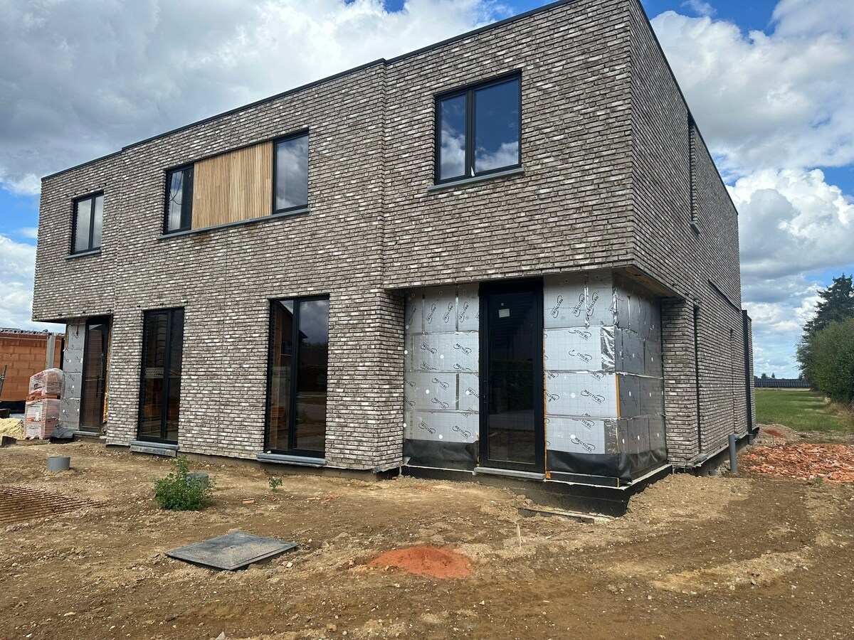 Mijmeren over de velden - in een luxueuze half open nieuwbouwwoning in Rotem 