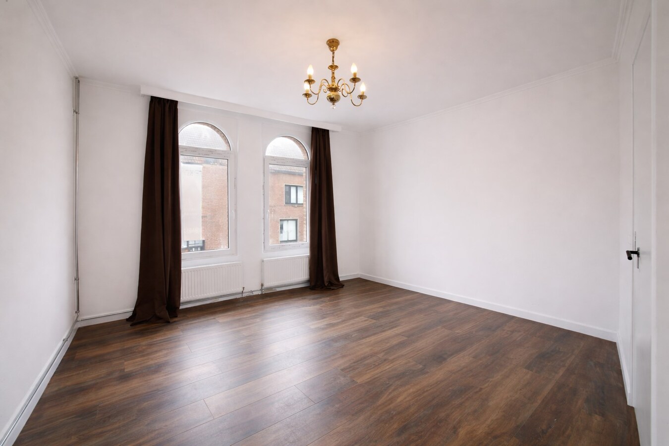 Te koop: Centraal gelegen woning met twee slaapkamers, zolderverdieping, EPC label C én tuin in Sint-Niklaas! 