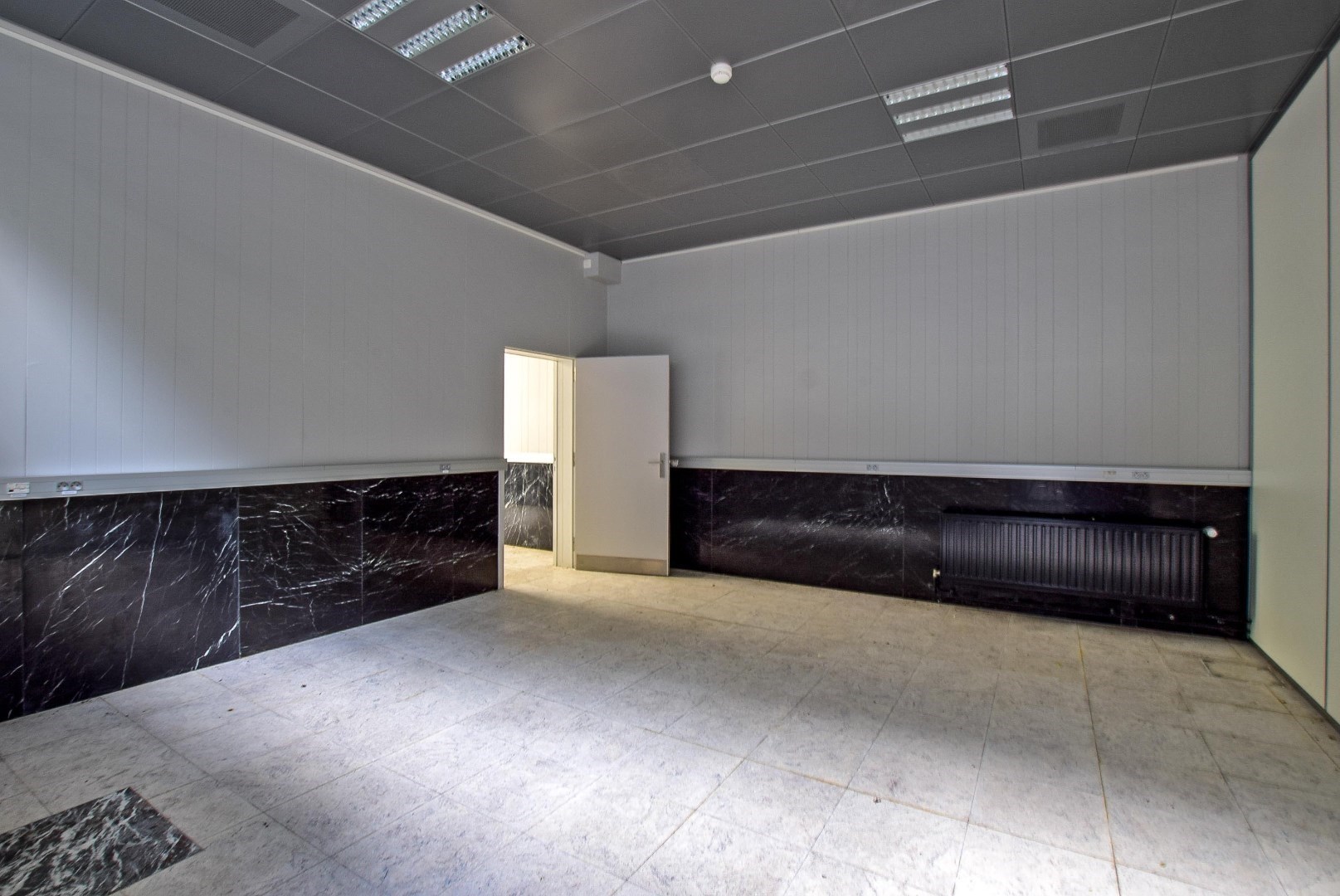 UNIEK ONTWIKKELINGSPROJECT IN HARTJE VEURNE - VOORMALIG BANKGEBOUW. 