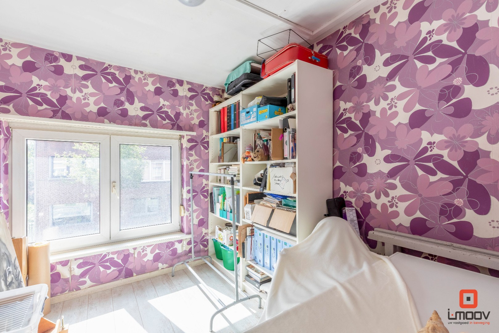 Karaktervolle tuinwijkwoning met unieke architectuur en garage te Gentbrugge 