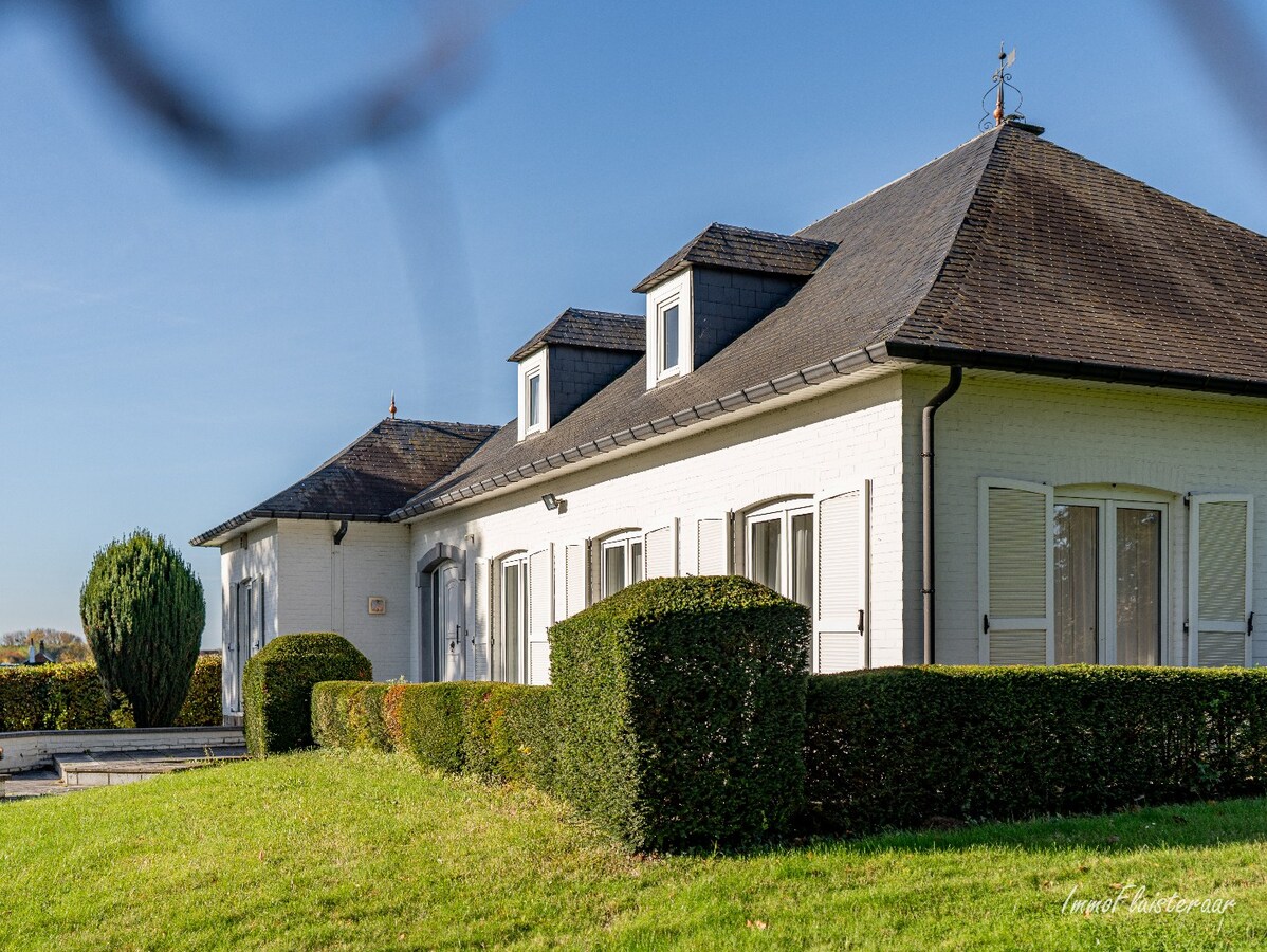 Rural villa with multifunctional outbuilding on approximately 51 acres in Bilzen 