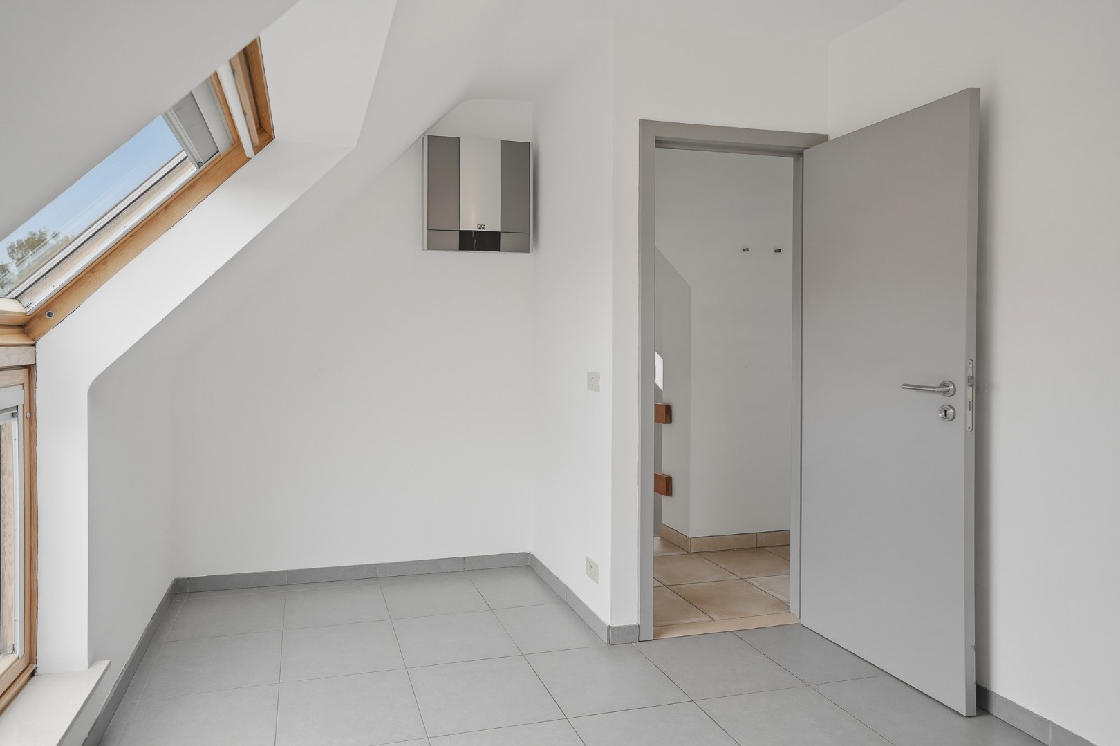 Instapklare rijwoning met garage op toplocatie in hartje Sint-Michiels 