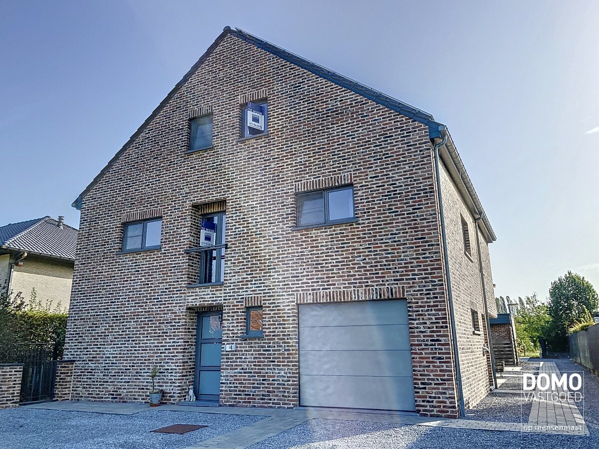 Ruim duplex appartement in Herk-de-Stad, 3 slaapkamers en tuin 