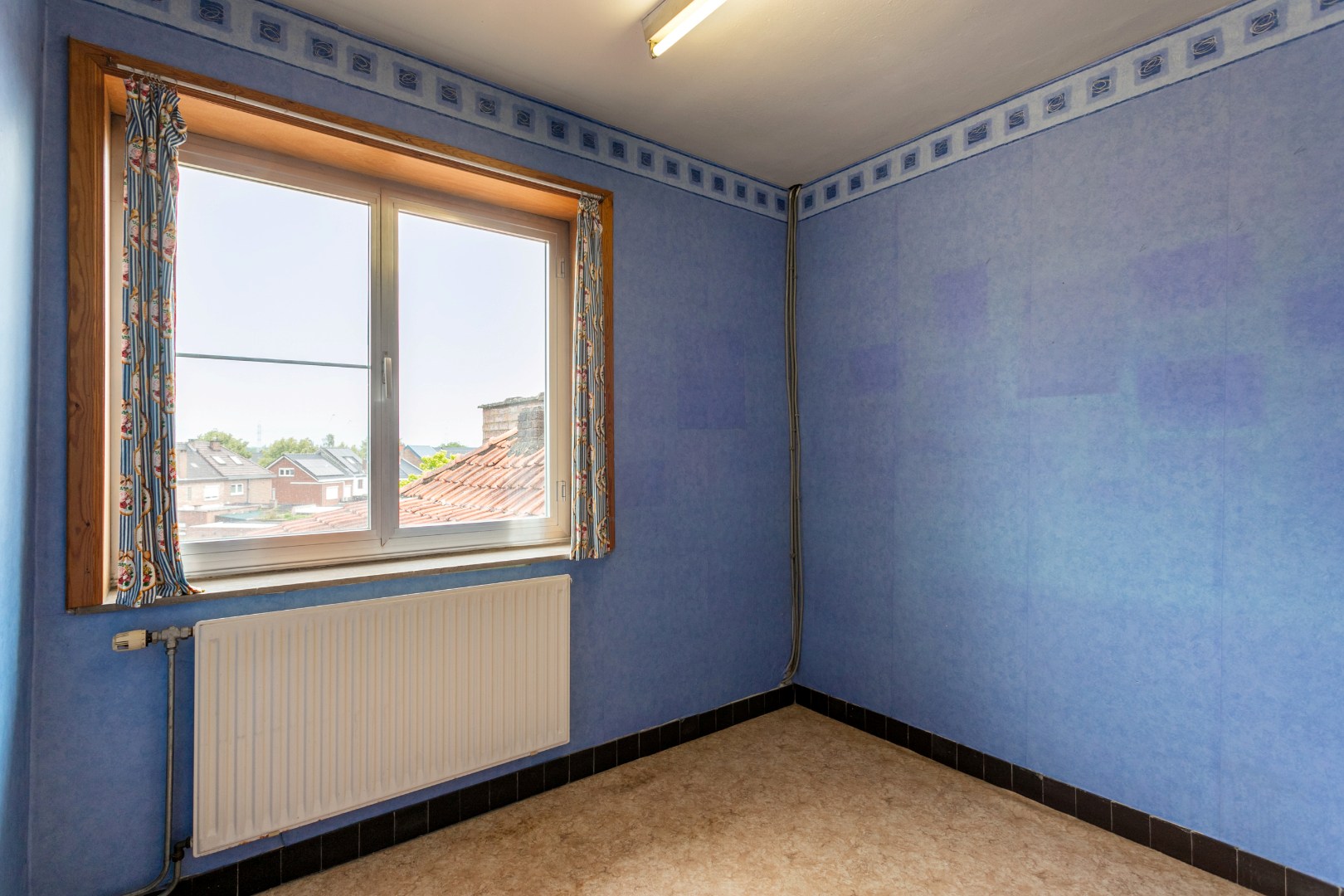 Te renoveren woning met 3 slpk te Buizingen 