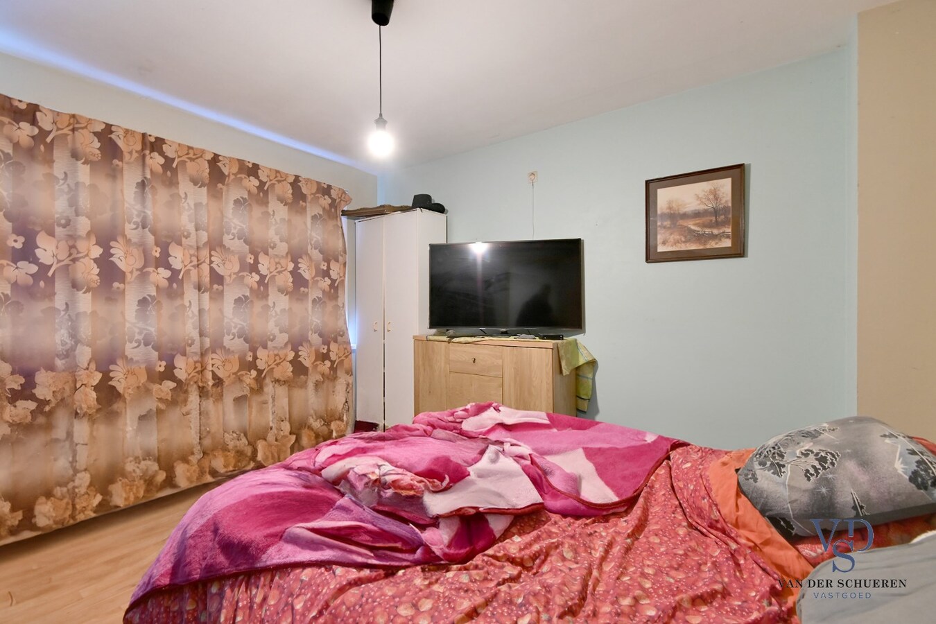 Woning met tuin - te renoveren. 