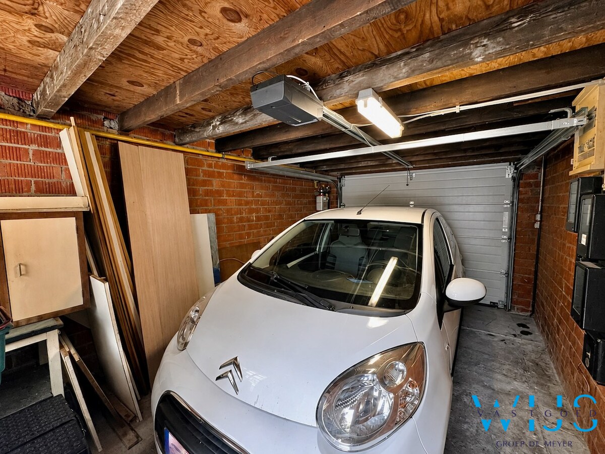 Praktisch en rustig gelegen woning met garage &amp; toffe tuin te Zelzate! 