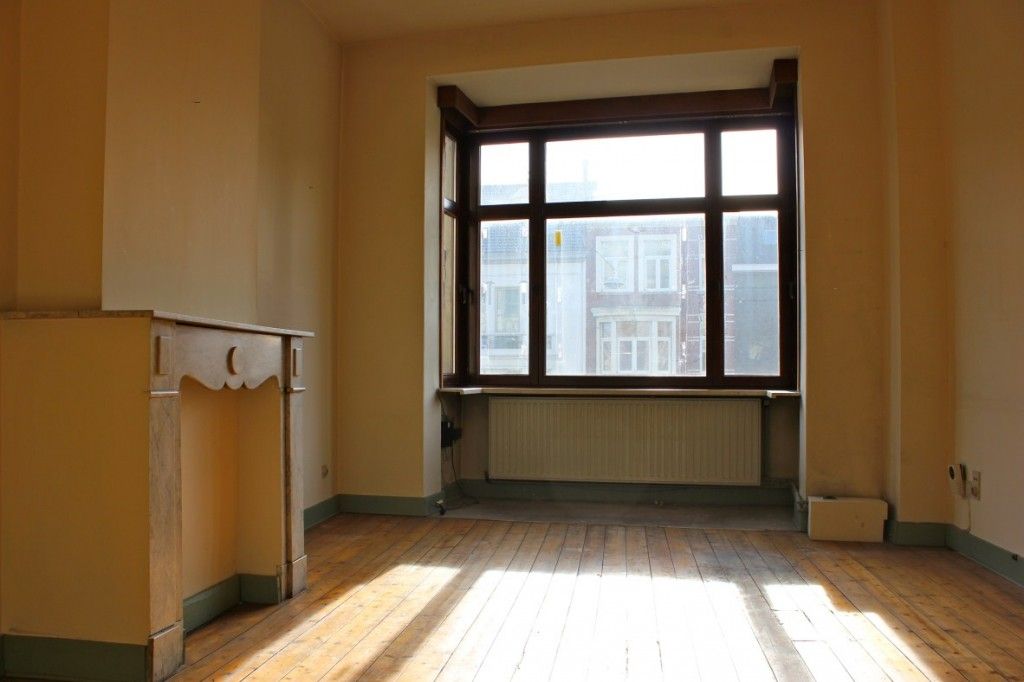 Indrukwekkend herenhuis met verschillende woonmogelijkheden op toplocatie! 