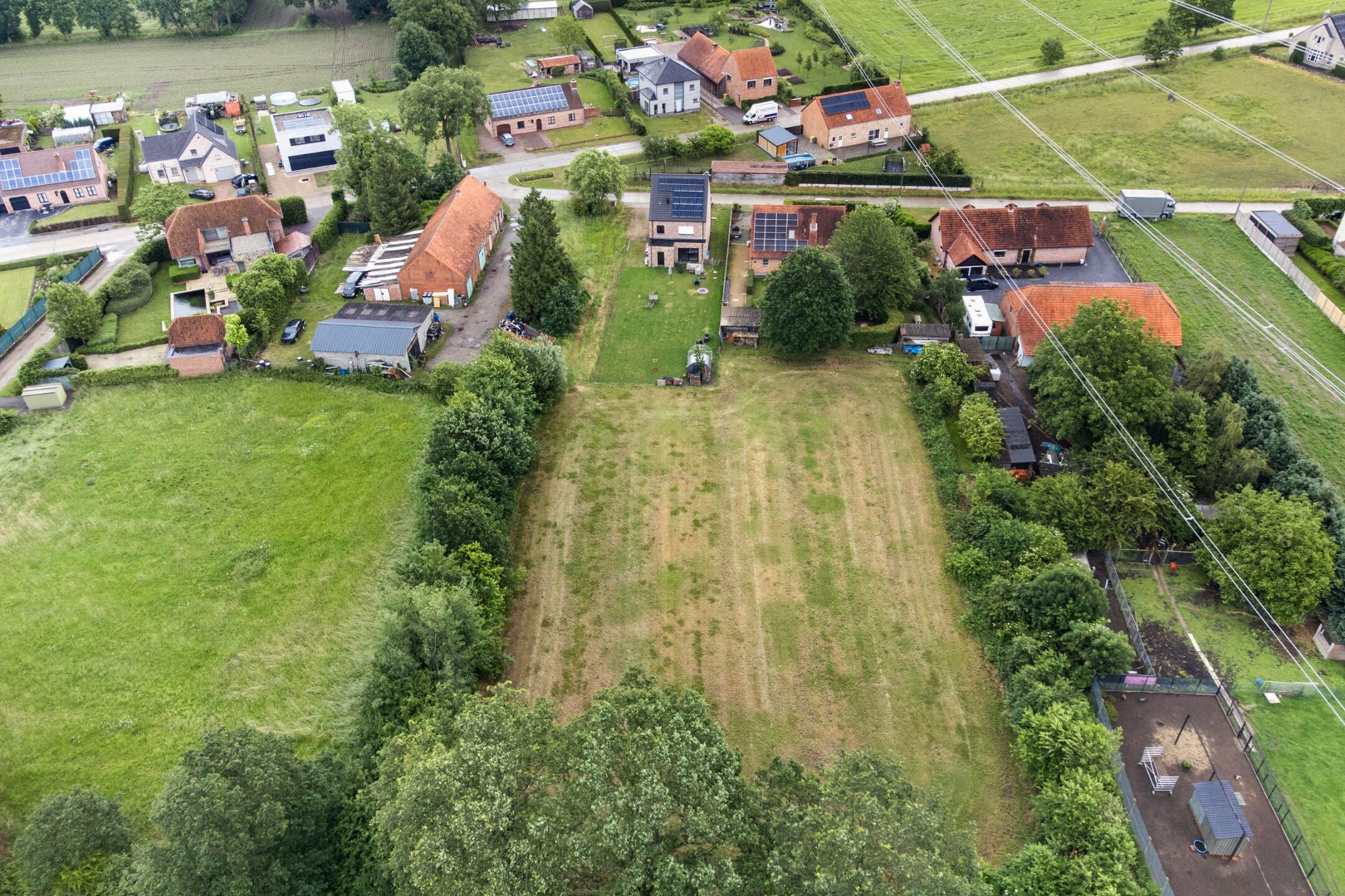 Bouwgrond voor open bebouwing met achterliggend weiland op 4.581 m² in Olmen 