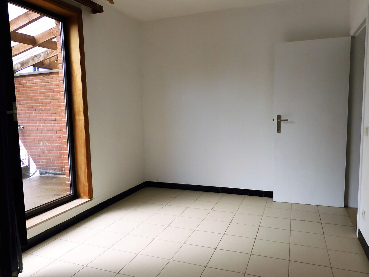 Aangenaam éénslaapkamerappartement met terras en privatieve garagebox 