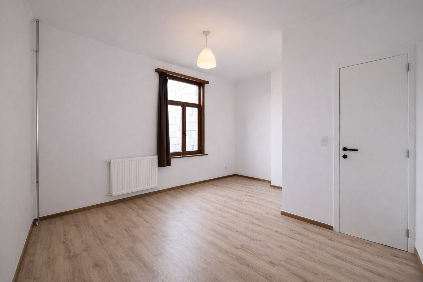 Te koop: Centraal gelegen woning met twee slaapkamers, zolderverdieping, EPC label C én tuin in Sint-Niklaas! 