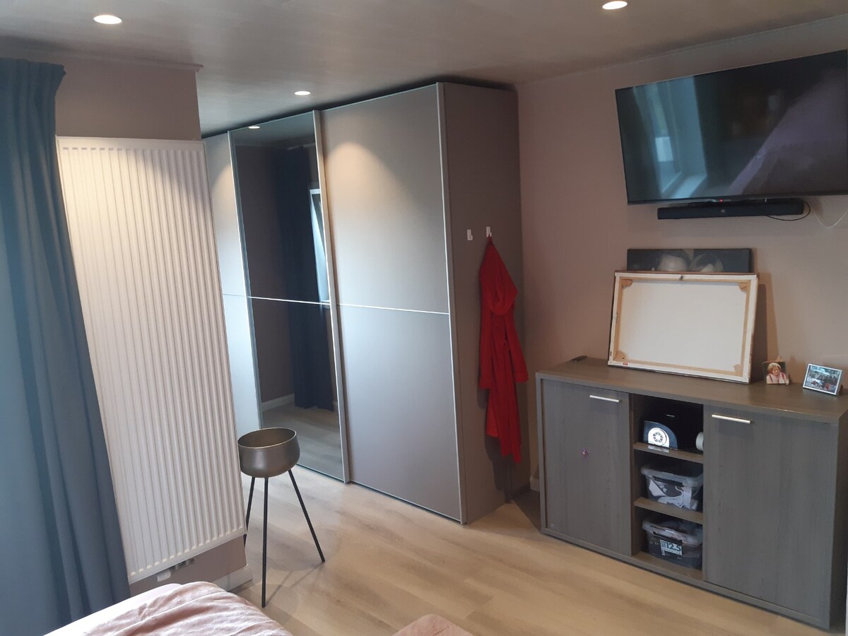 Praktische gezinswoning met leuke tuin. 