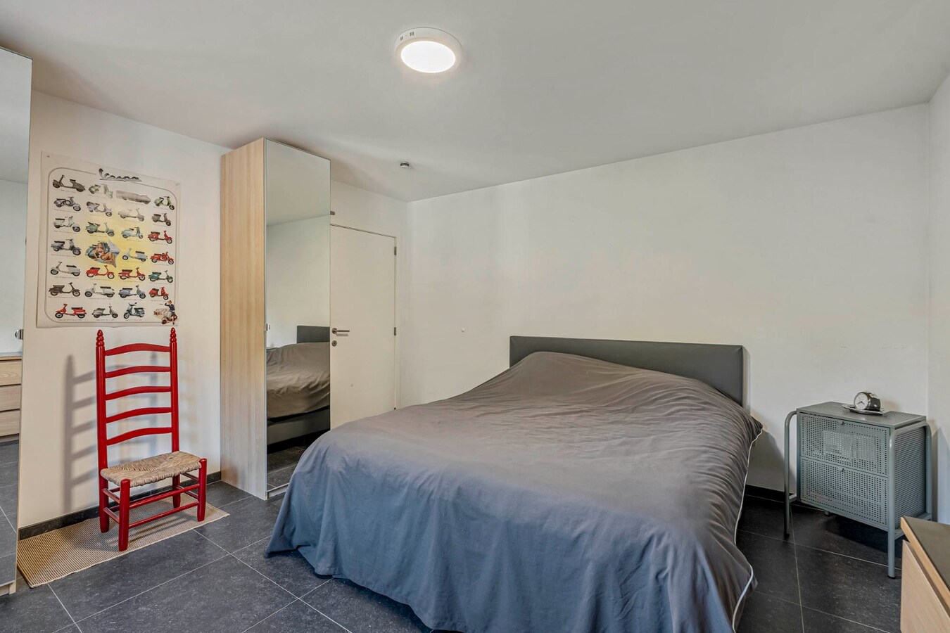 Comfortabel, gelijkvloers appartement mét ruime tuin en carport! 