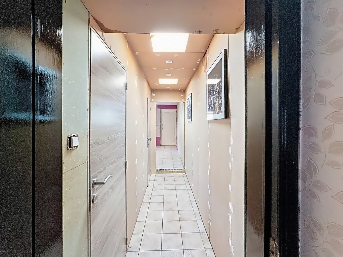 Te renoveren woning in Harelbeke met 6 slaapkamers en veel potentieel 