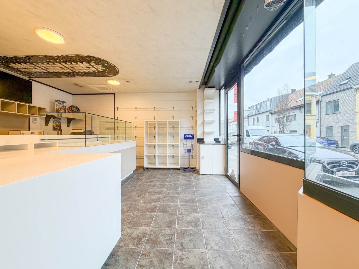 Handelspand bestaande uit winkel met woning, productieatelier en groot magazijn, Torhout 