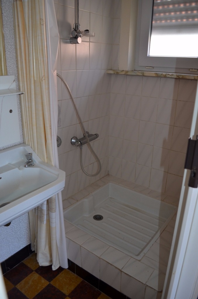 Te renoveren woning met garage nabij centrum Maldegem 