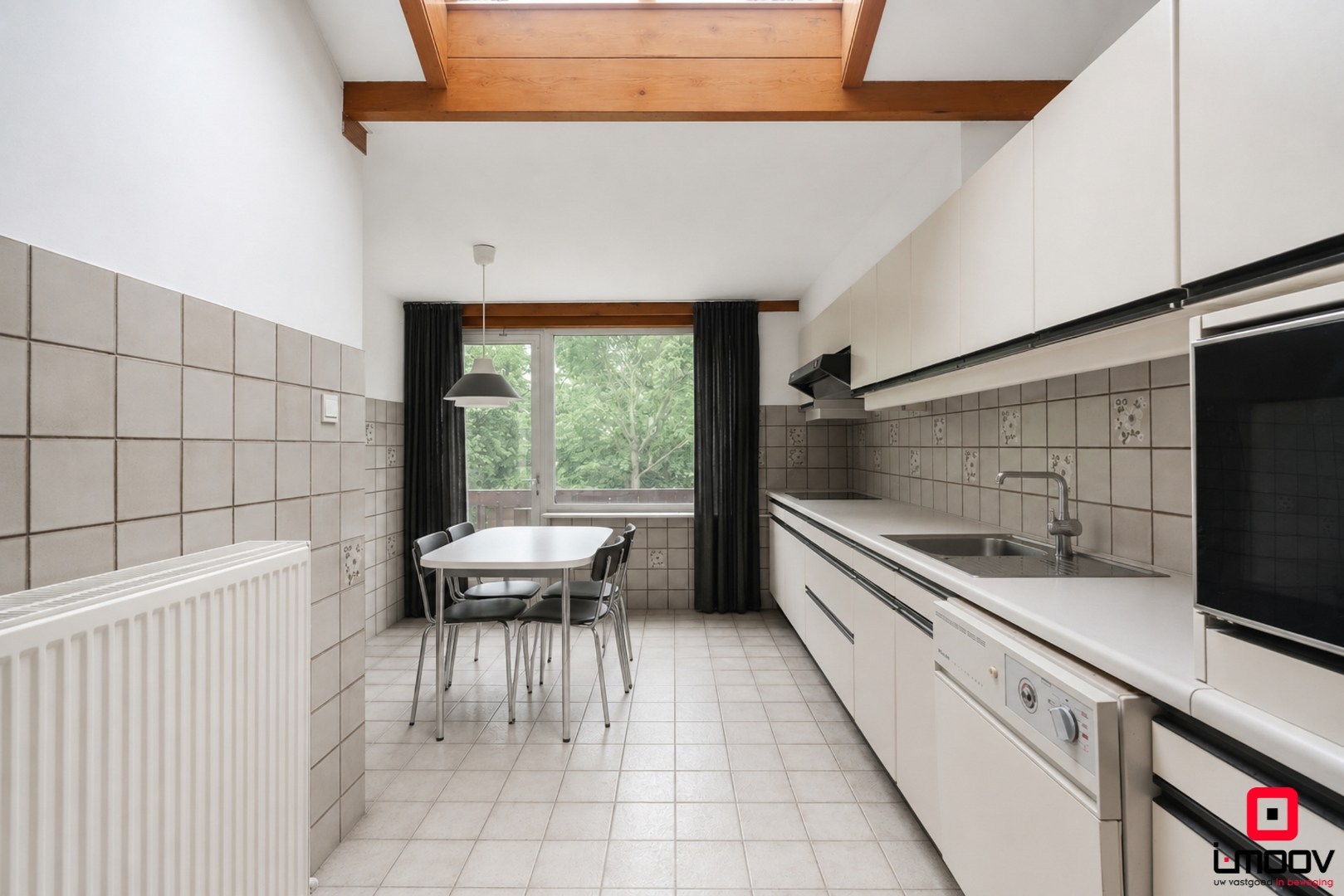 Karaktervolle voormalige apotheekwoning met groene tuin aan het water nabij UZ Gent 