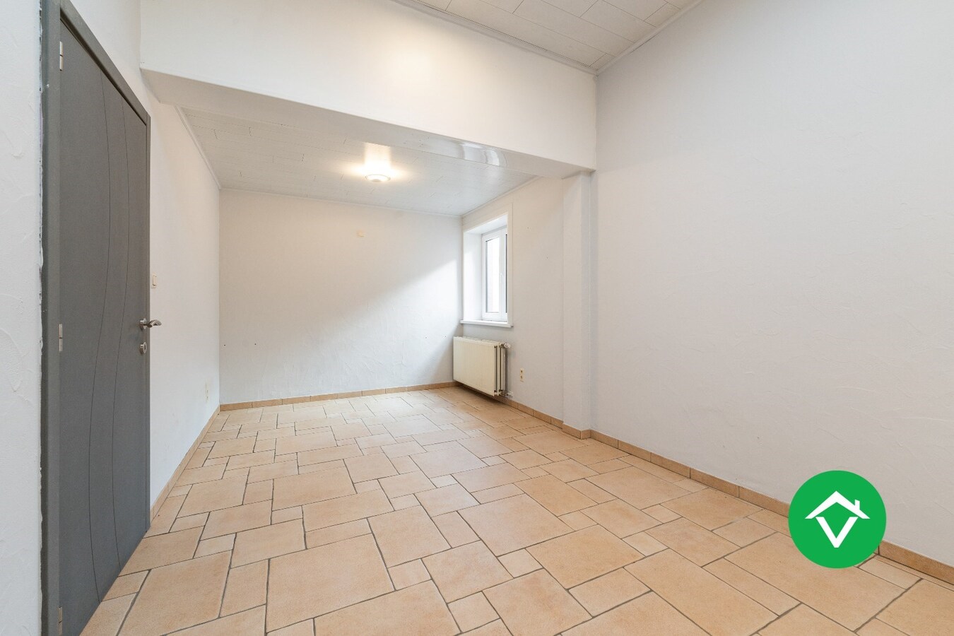Woning met appartement te koop in het centrum van Eernegem 