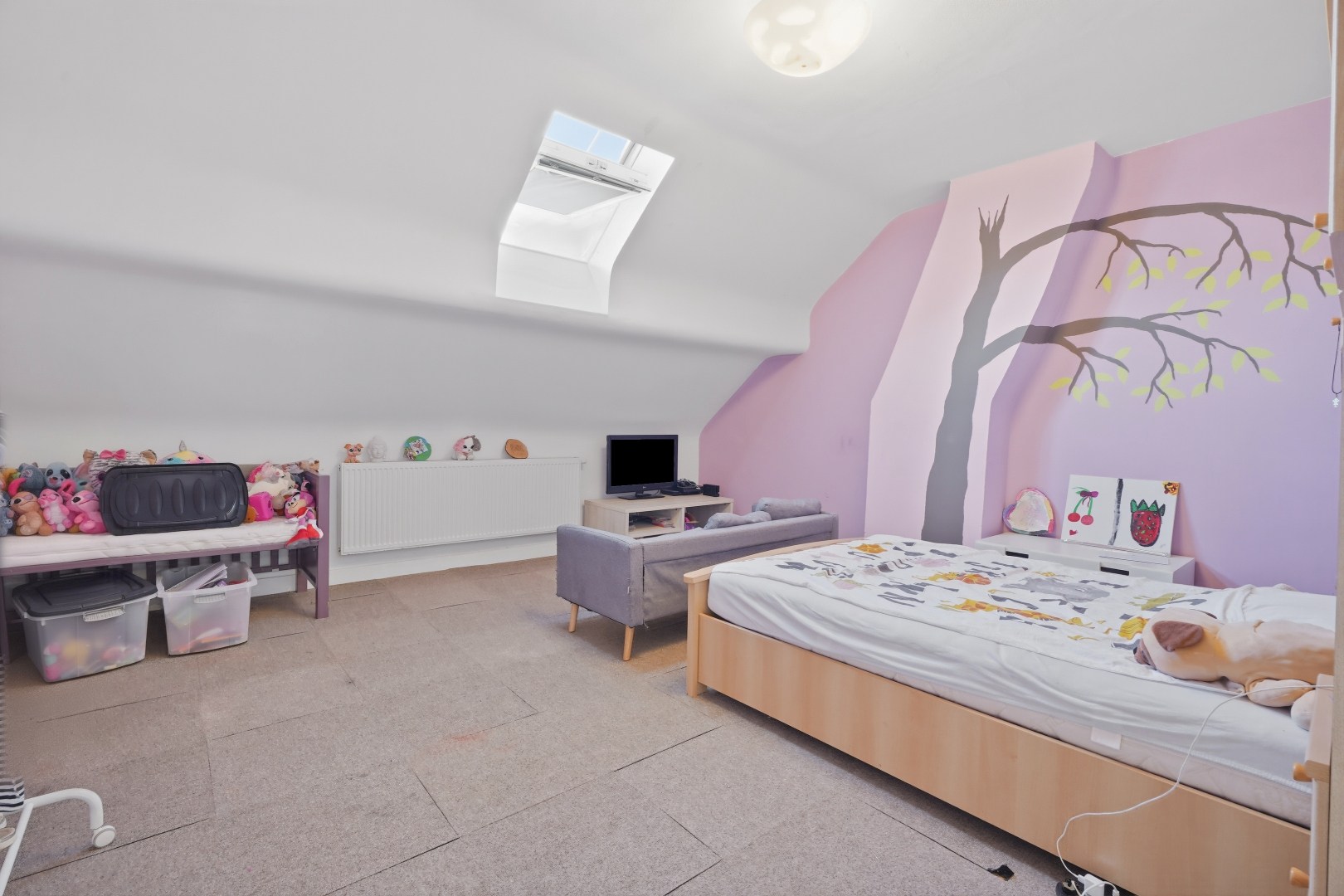 Ruime rijwoning met zongerichte tuin in Nieuwpoort-Stad. 