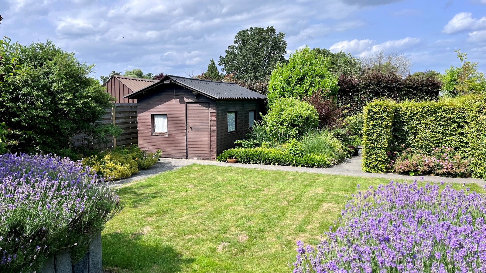 Goed onderhouden woning met tuin, terras en inpandige garage in Kermt - Energielabel E 