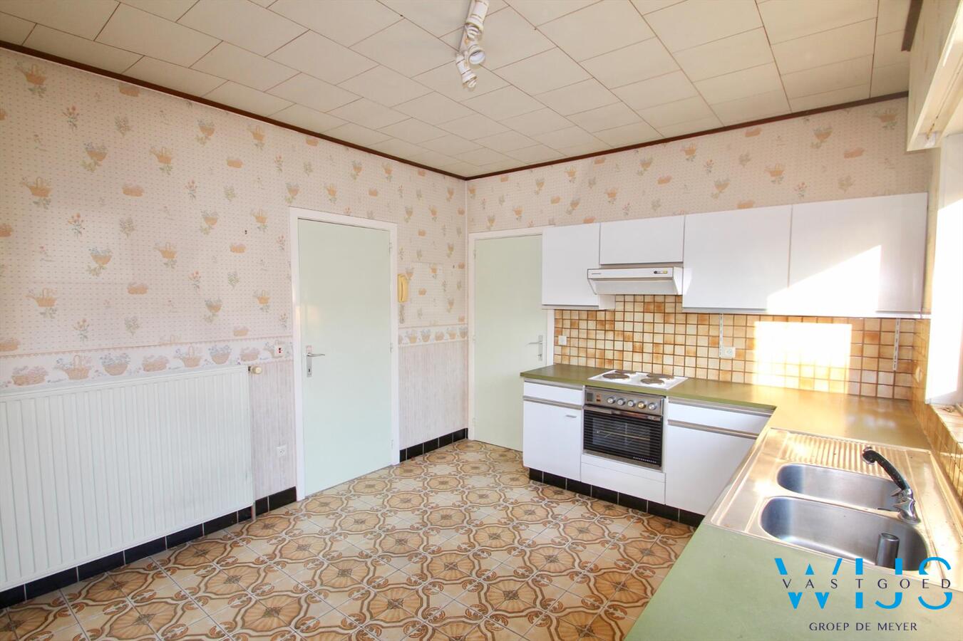 Charmante open bebouwing gelegen in gezellige wijk te Evergem! 