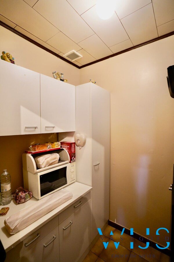 Woonhuis op 1000m² in hartje Ertvelde ! 