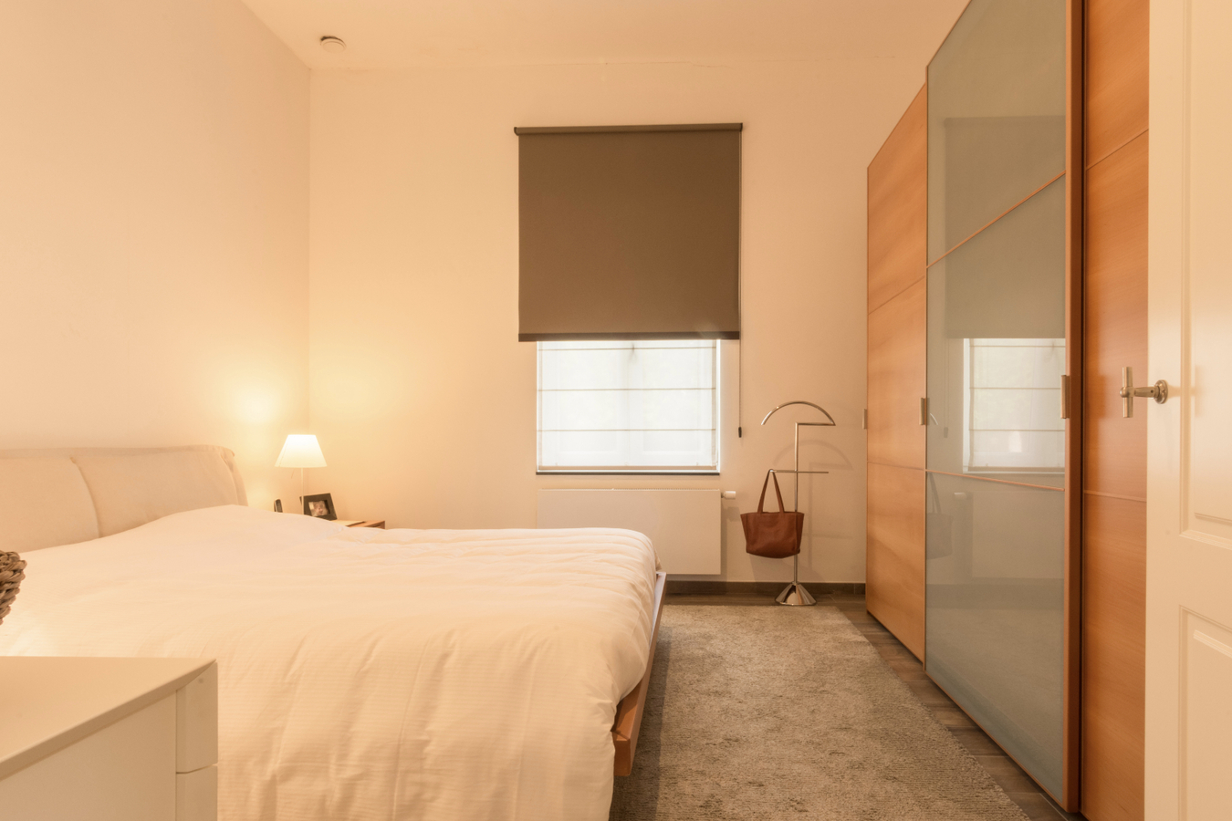 Gelijkvloers luxe 2-slk-appartement met privatieve tuin. 