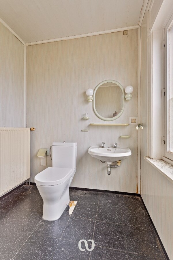 Te renoveren gezinswoning met mooie tuin in Oudenaarde 