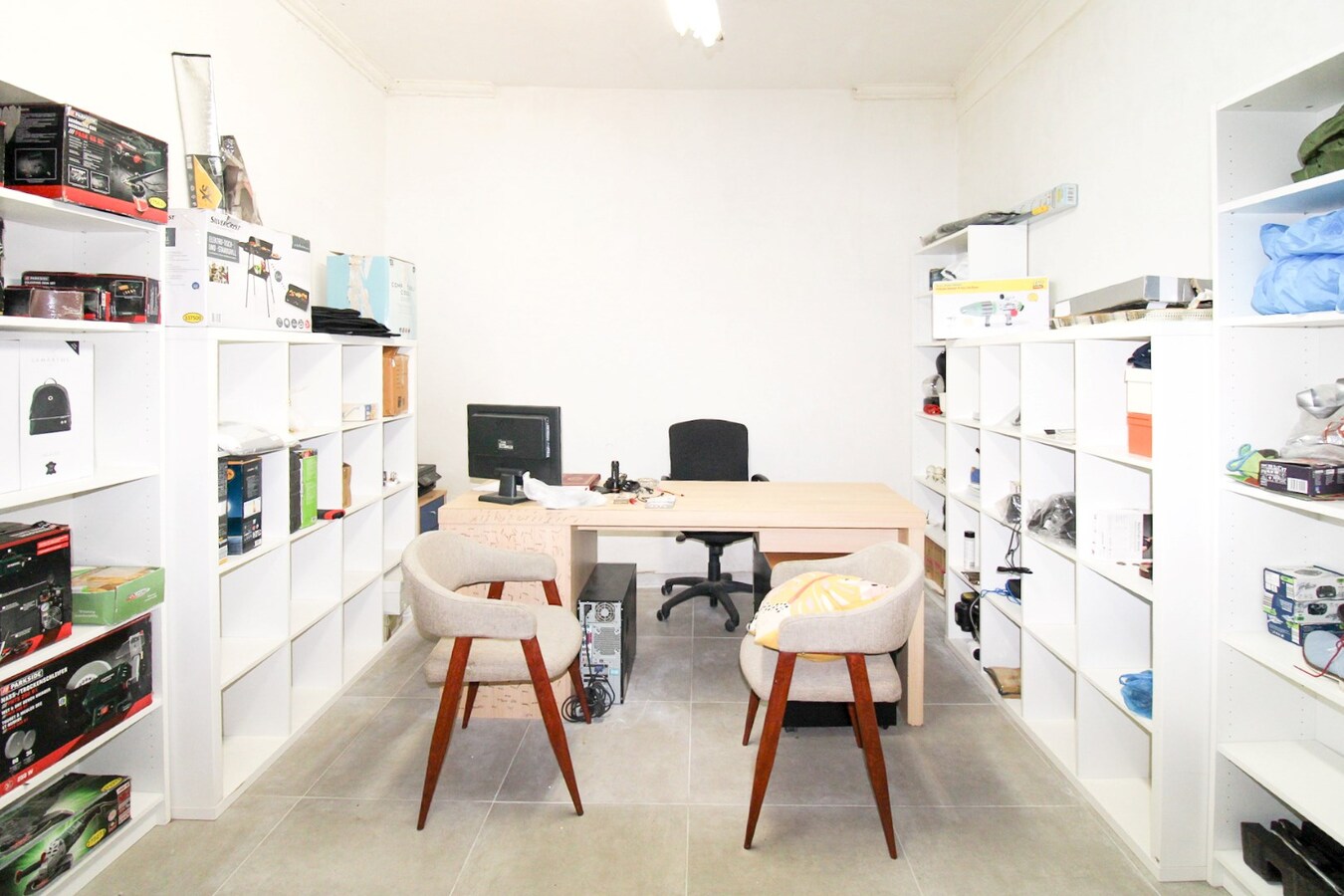 Investeren in het hart van Sint-Niklaas: Veelzijdig handelshuis met uitbreidingspotentieel in bruisend centrum te koop 