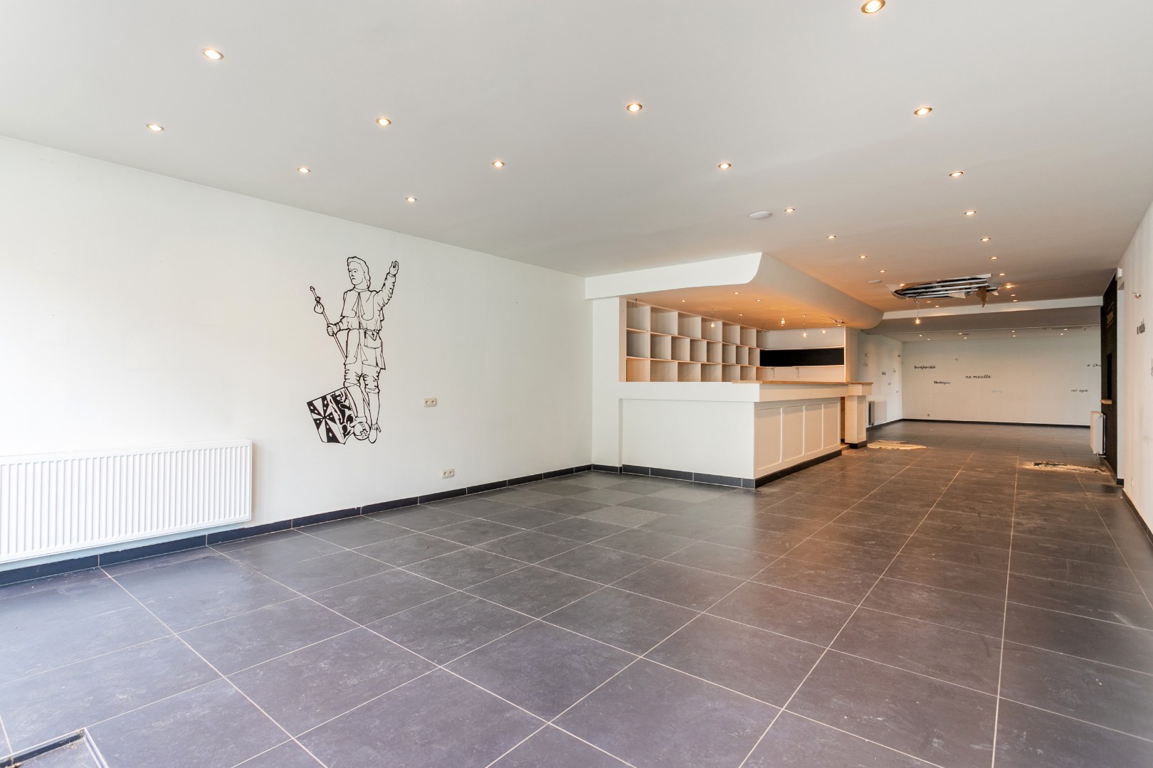 Handelsruimte met woonst op een gunstige ligging 