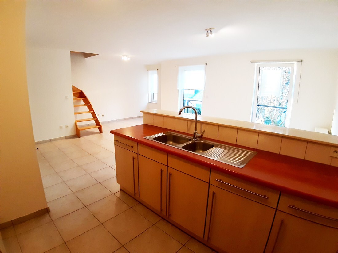 Gunstig gelegen duplex appartement te Genk 