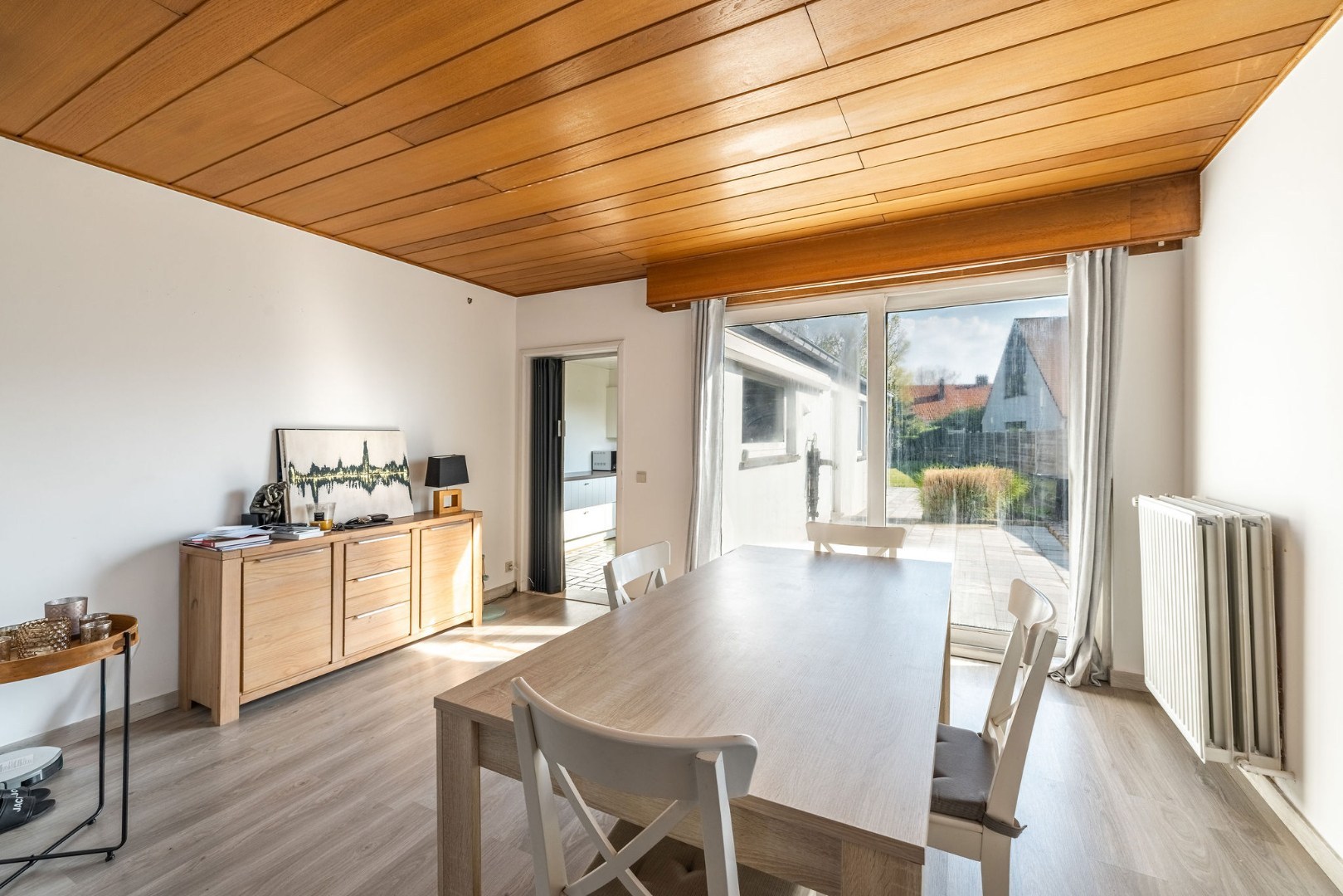 Authentieke woning met zonnige tuin, garage en bouwgrond 
