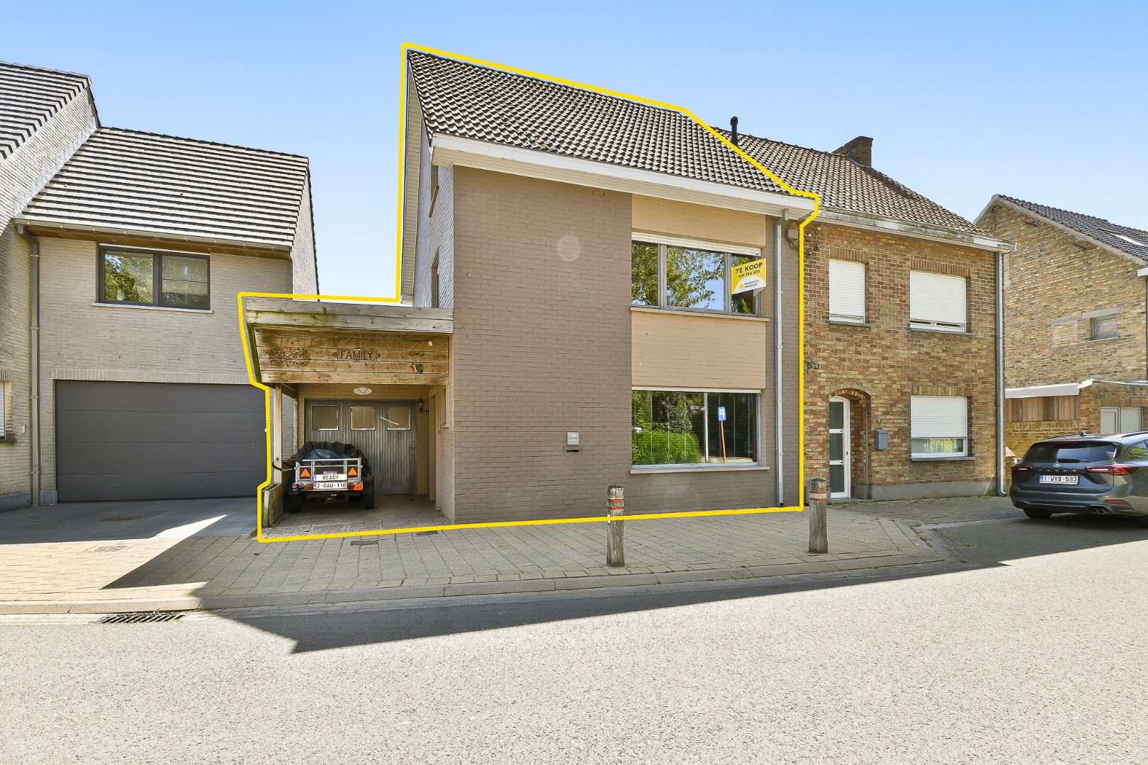 Woning met drie slaapkamers, garage en zonnige tuin 