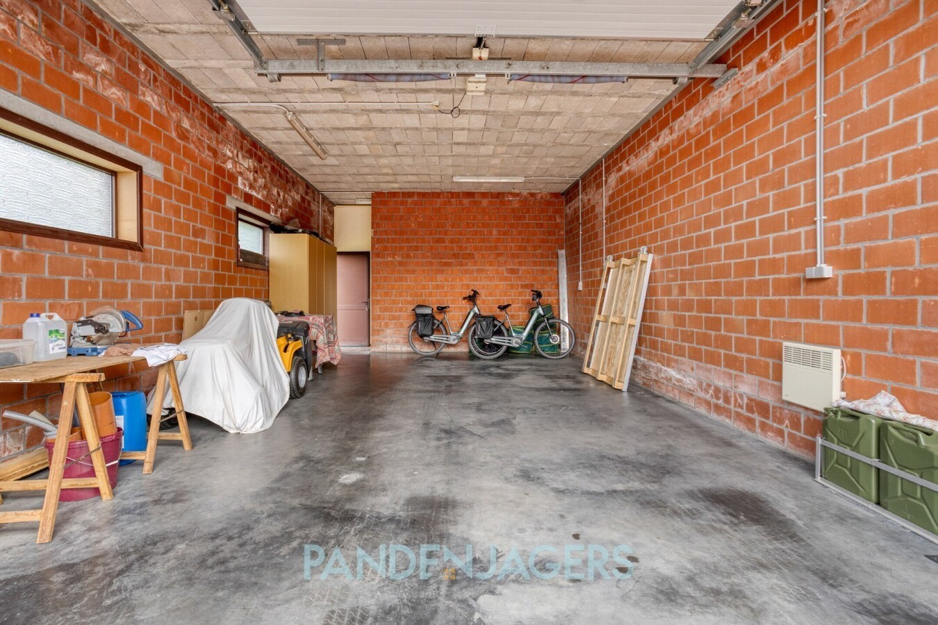 Ruime open bebouwing met groot bijgebouw te Duffel 