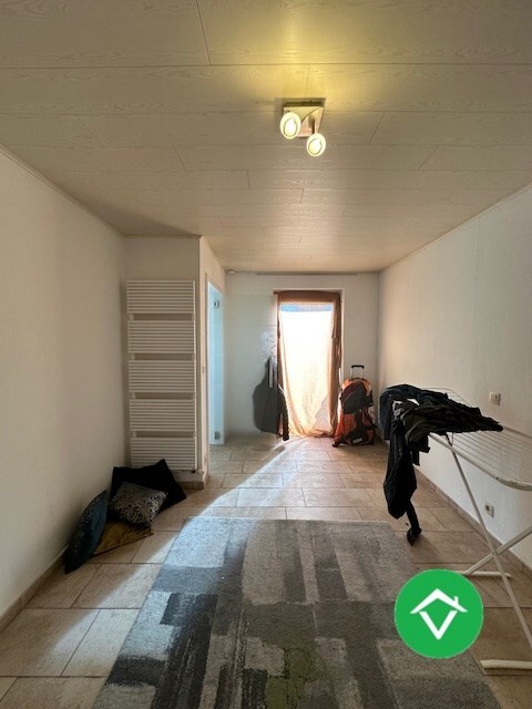 Instapklaar gelijkvloers appartement met tuin en garage in rustige wijk te Eernegem 