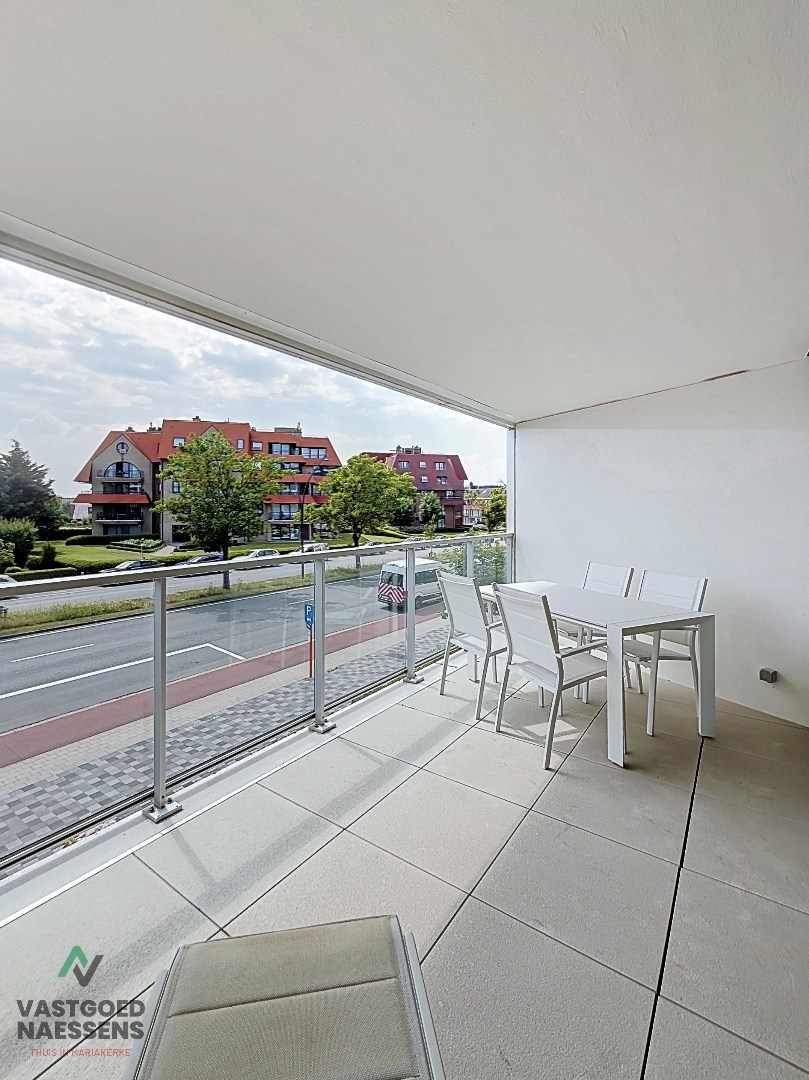 SCHITTEREND 2 SLPK APP MET ZONNIG TERRAS IN RECENT GEBOUW 