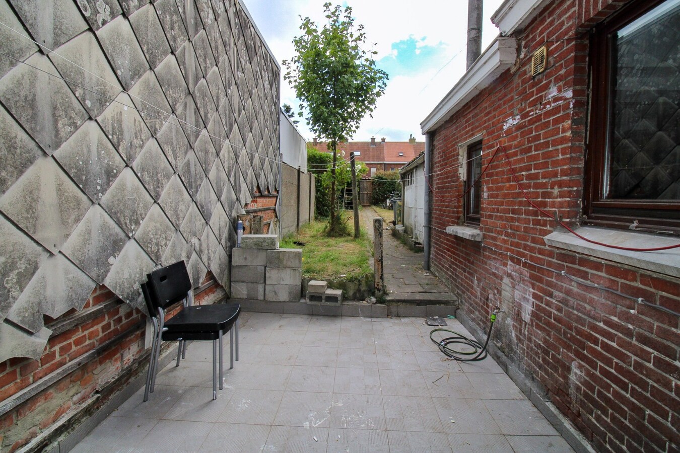 Te koop: Charmante rijwoning met diepe tuin in hartje Sint-Niklaas! 