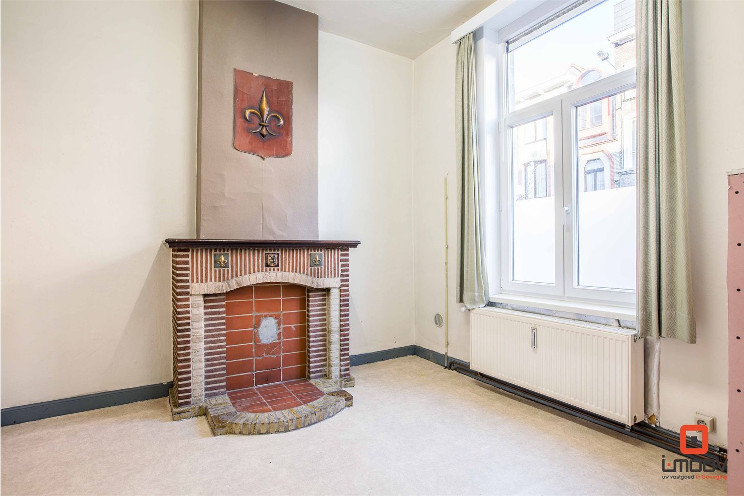 Mooie opbrengsteigendom met vijf lichtrijke studentenkamers 