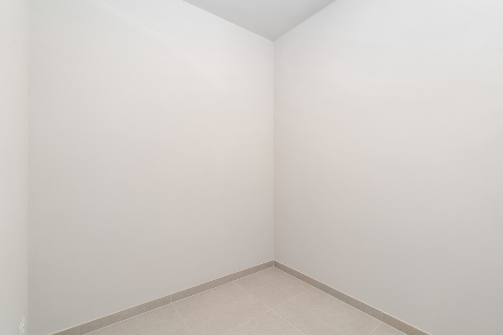 Nieuwbouwappartement met twee slaapkamers, terras en ondergrondse autostaanplaats te koop in Zulte 