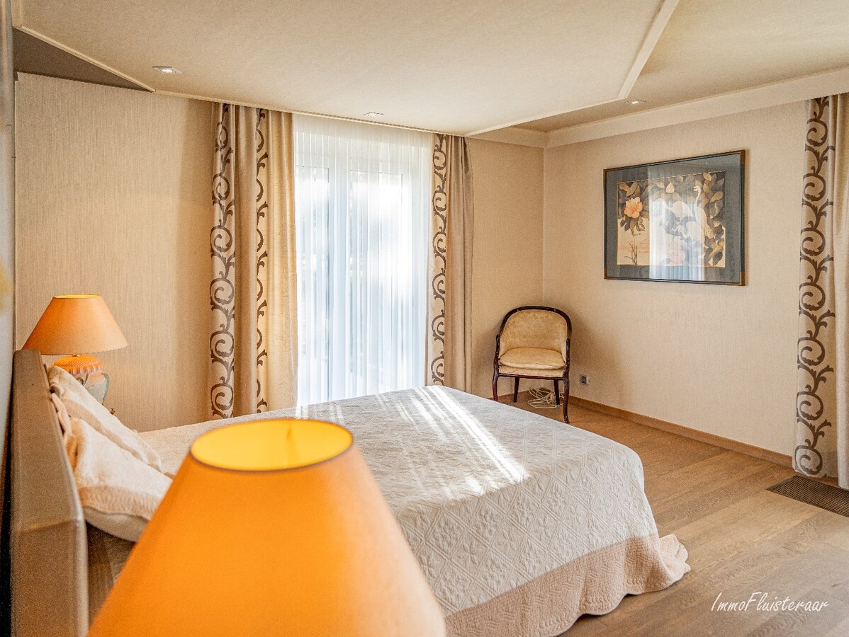 Rural villa with multifunctional outbuilding on approximately 51 acres in Bilzen 