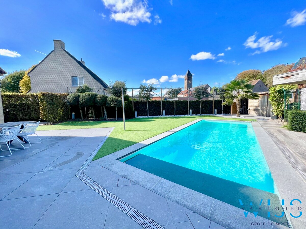 Zwemmen met zicht op de kerktoren van ERTVELDE ! 