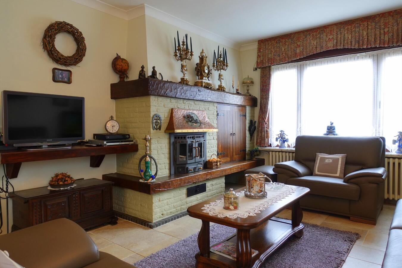 Uitzonderlijke woonst met werkplaats 