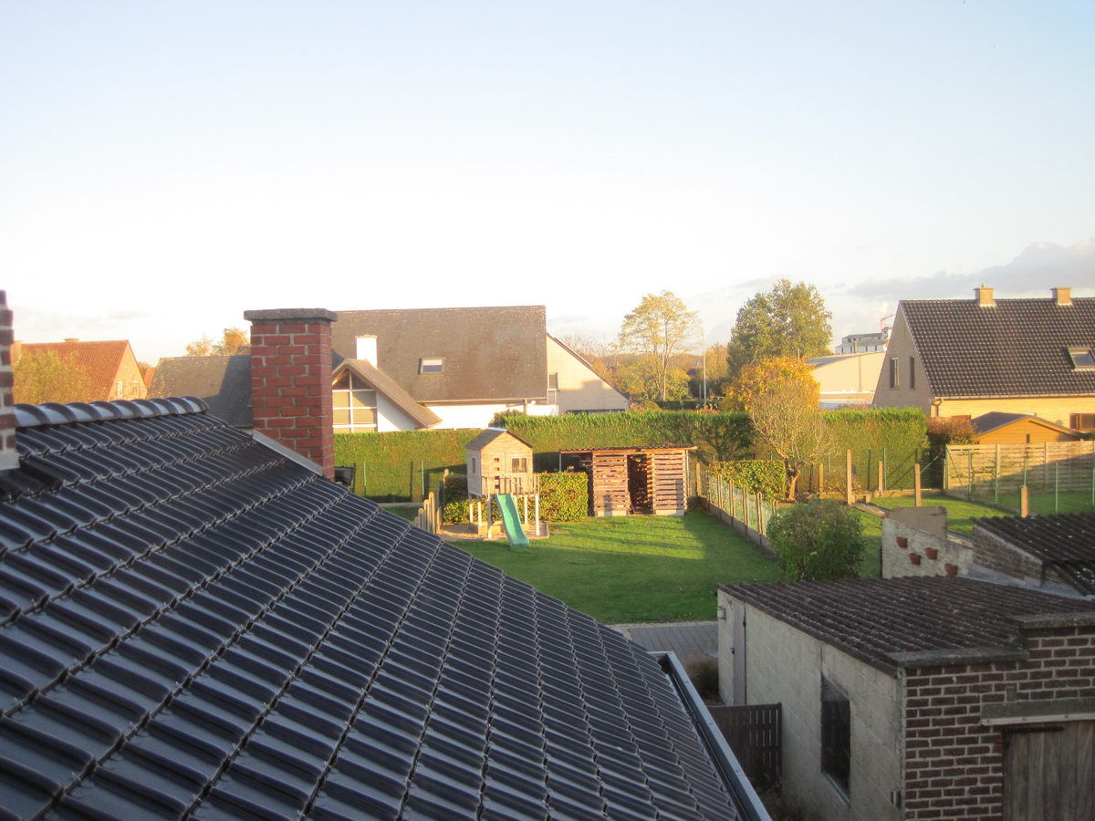 Degelijke én gezellige woning. Met tuin en met garage. 