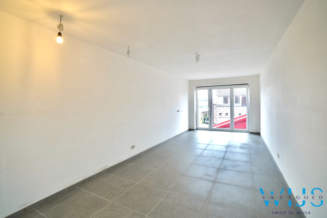 Drieslaapkamer appartement met garage in hartje Ertvelde ! 