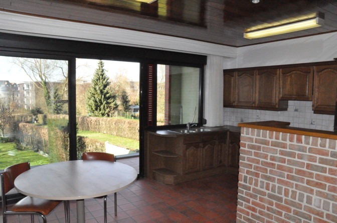 Gezellige, degelijke woning met aangename tuin. 