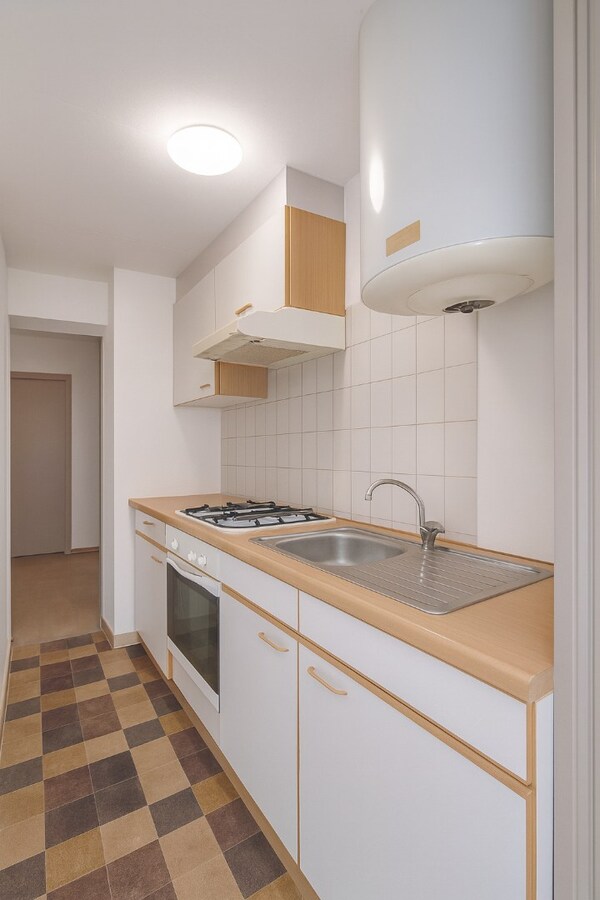 Uniek handelshuis met voormalig café en twee duplexappartementen te koop op toplocatie in het hart van Sint-Niklaas! 