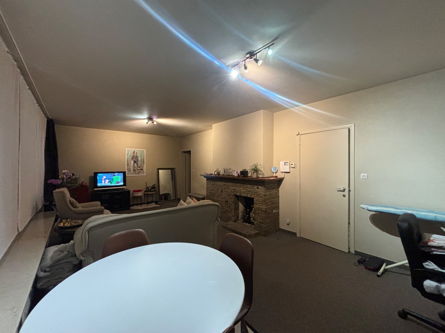 Opbrengsteigendom met 7 appartementen &amp; ruim handelspand in Mol-centrum 