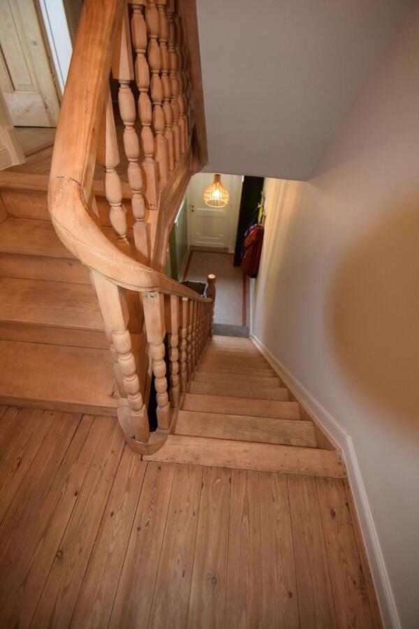 Kwalitatief gerenoveerde, ruime 4-slpk-woning met toffe stadstuin op Christus-Koning 